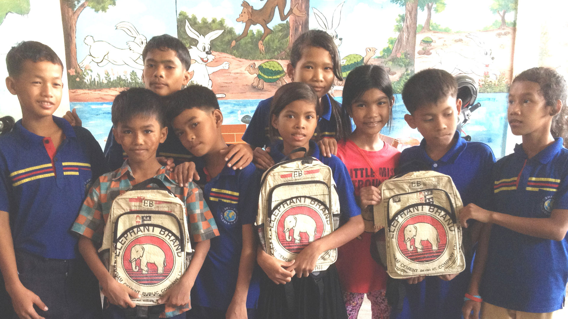 Children with Elephant Branded bags