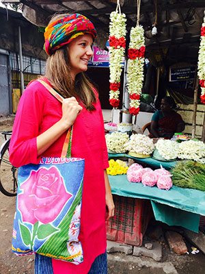 Woman with Buy Rice Back tote bag