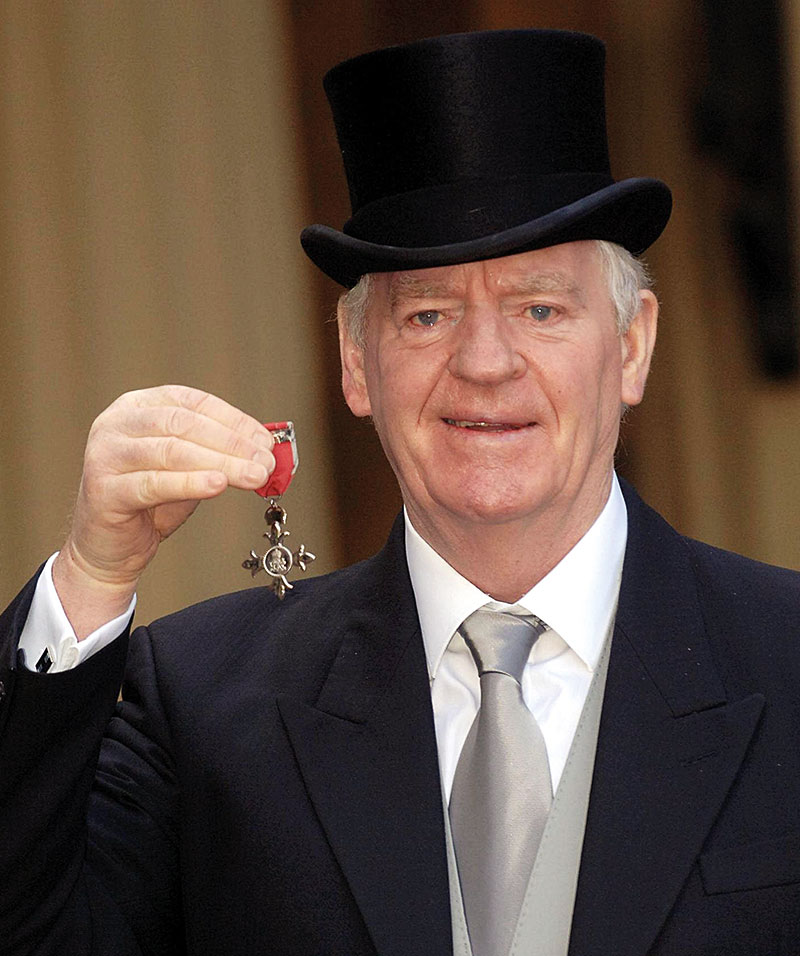 Lawrie McMenemy receiving his MBE at Buckingham Palace in 2006