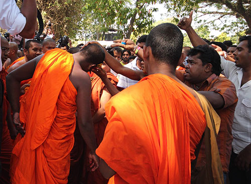 Sinhala Ravaya monks clash with police outside government buildings