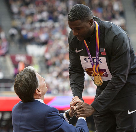 IAAF chief Sebastian Coe awards Justin Gatlin his gold medal for the London 2017 100 metres