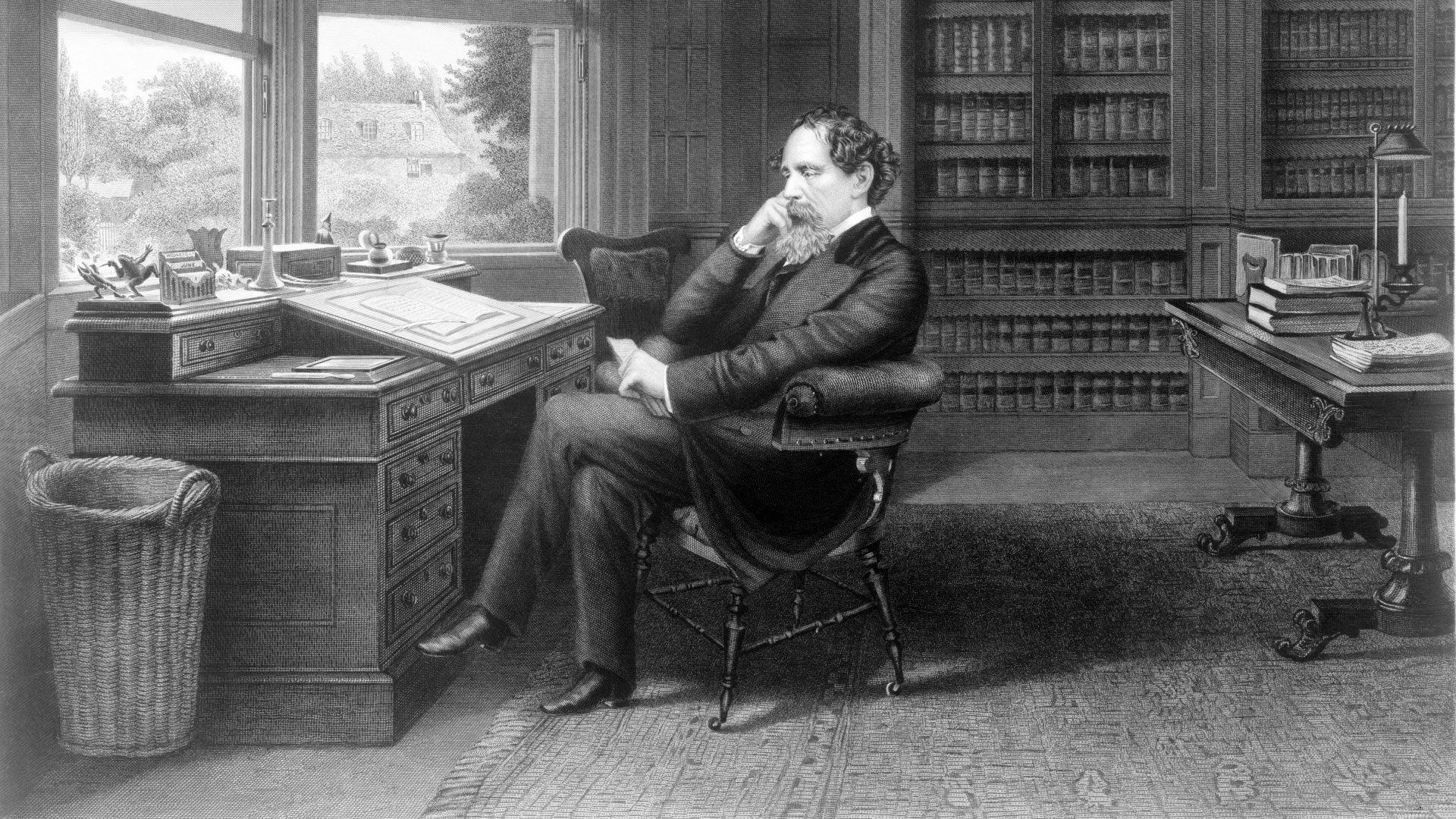 Charles Dickens at writing desk