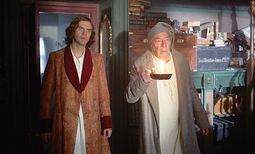 Dan Stevens and Christopher Plummer in The Man Who Invented Christmas