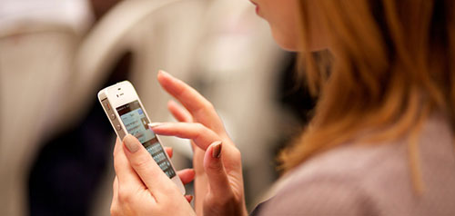 Young woman using mobile phone