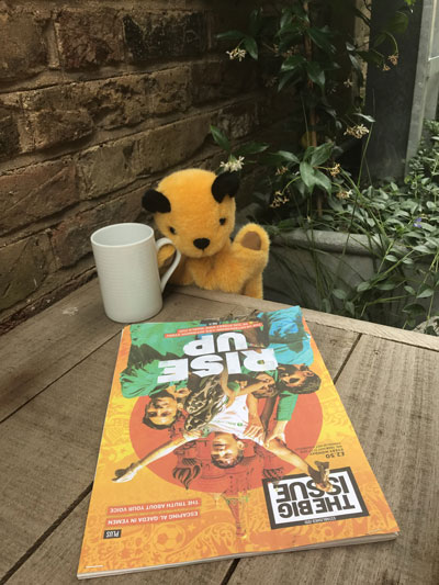 Sooty enjoys reading The Big Issue