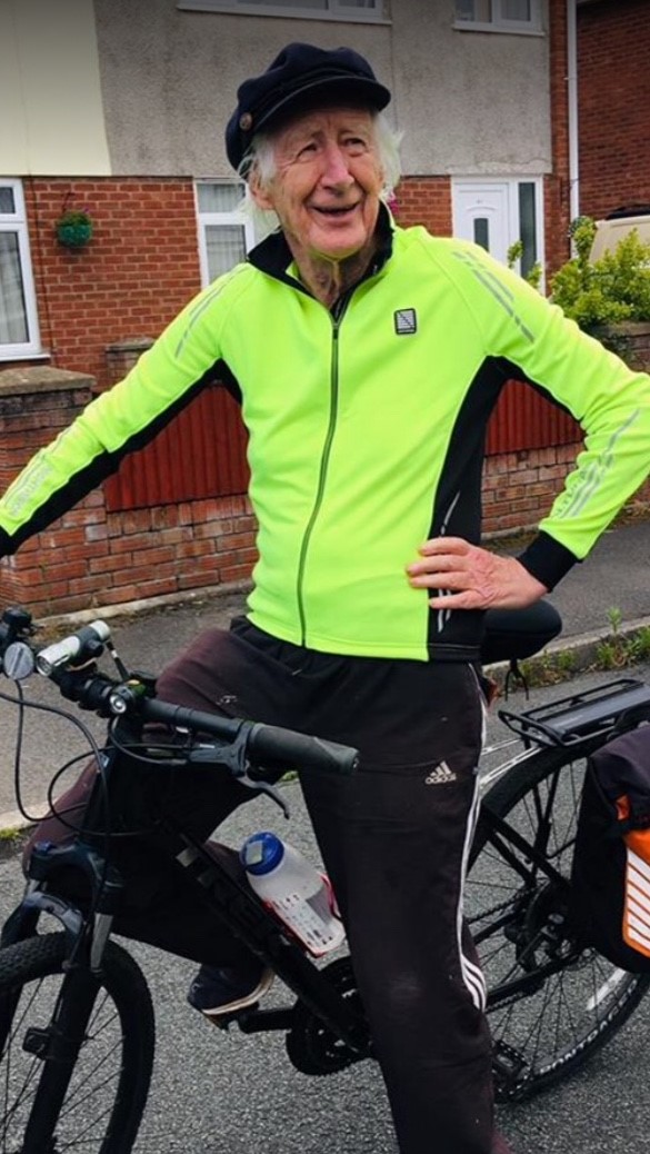 Laurence Brophy rests on his bike during one of his cycles to help end homelessness