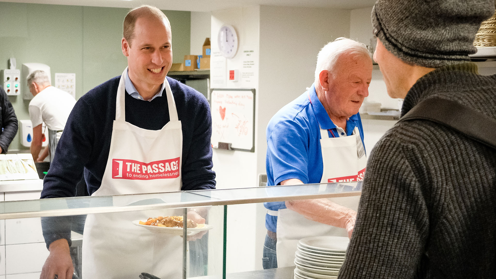 Prince William serving food