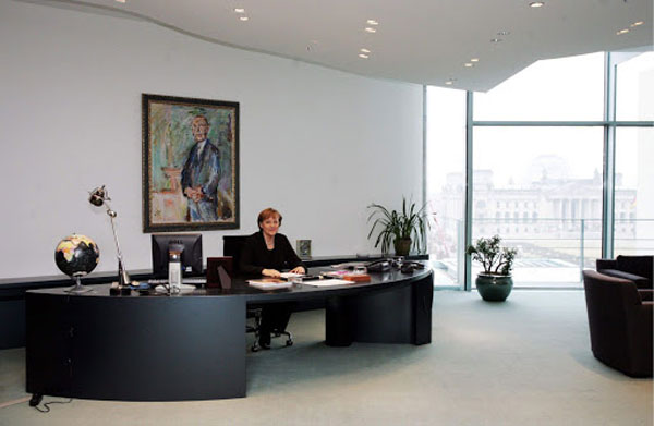 Angel Merkel at her desk