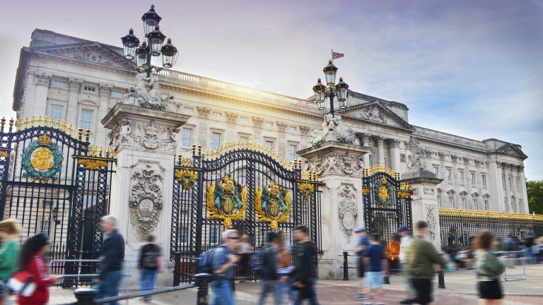 People walking in front of Buckingham Palace