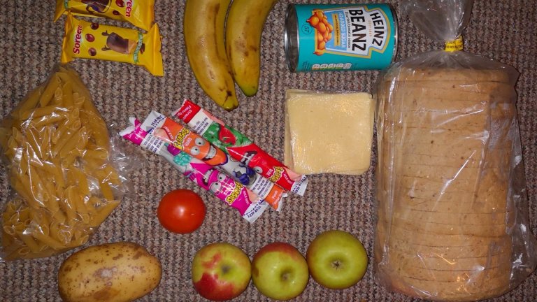 A small amount of food laid out after being delivered to replace free school meals for two weeks for a child