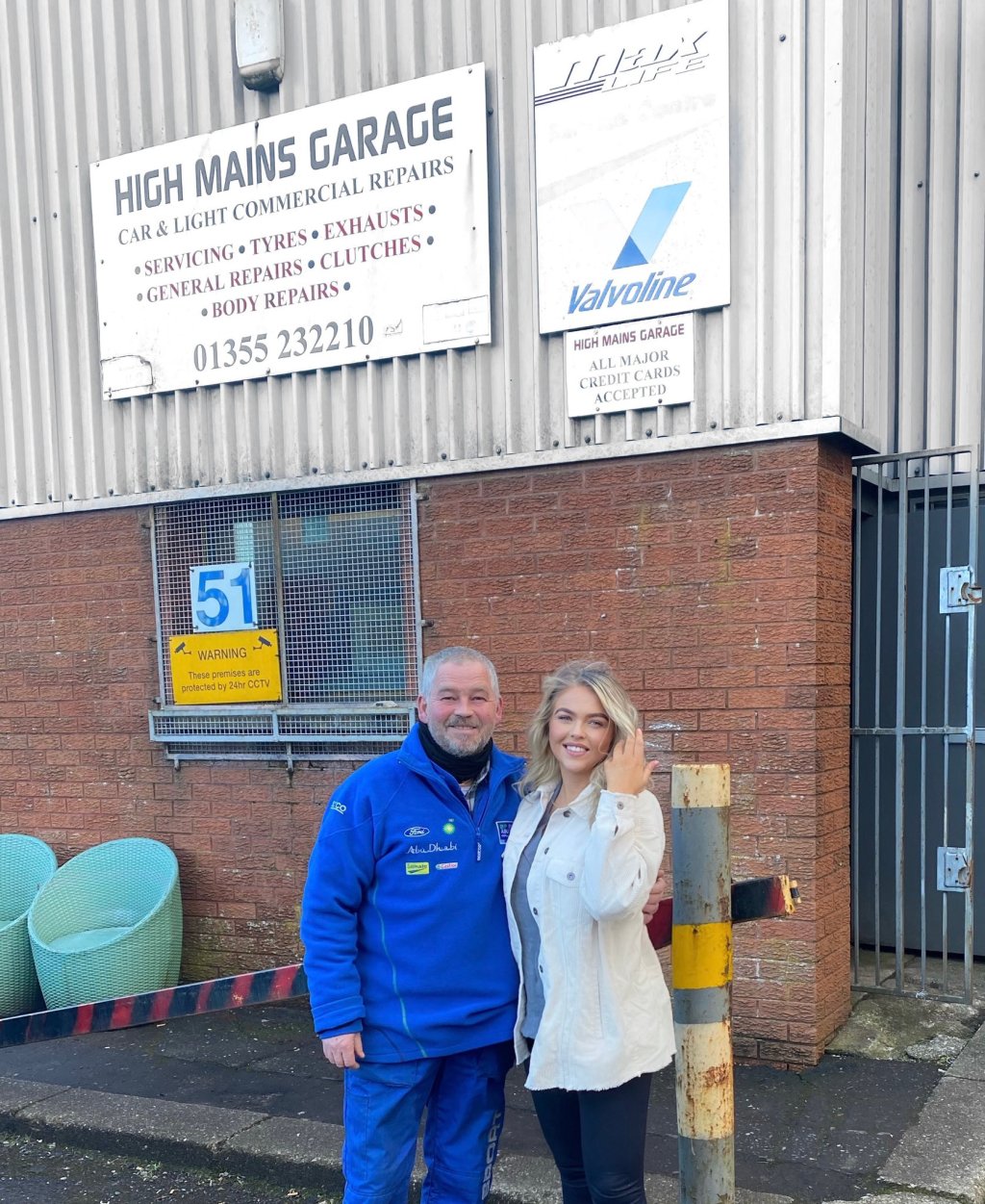 Jim Walsh and daughter Harley outside Highmains Garage in East Kilbride, Scotland. Image credit: Supplied
