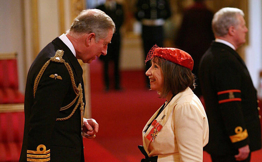Kay Mellor receiving her OBE from the Prince of Wales at Buckingham Palace.