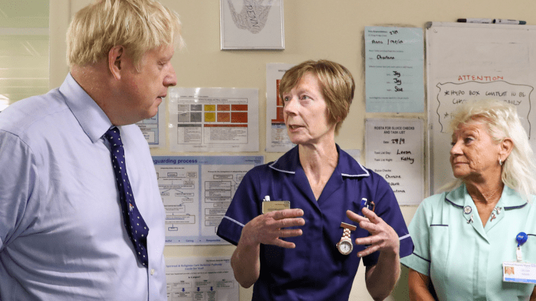 Boris Johnson visits Princess Alexandra Hospital in Essex in 2019. Labour has sought to reignite the row over nurses pay ahead of May’s local elections. Image credit: Number 10 / Flickr