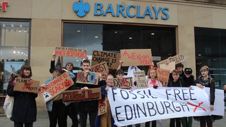 Demonstrators protesting Barclays' fossil fuels investment in 2017