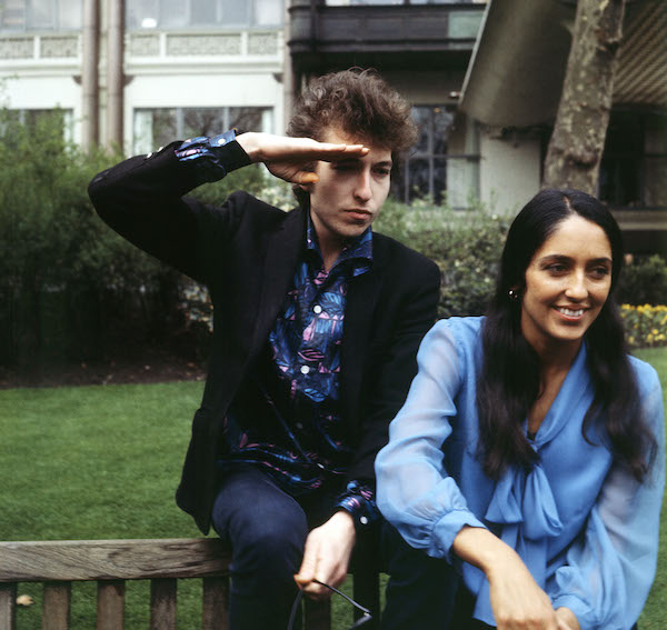 Joan Baez joins Bob Dylan in London's Embankment Gardens in 1965.