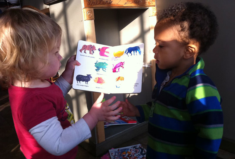 Children enjoying Eric Carle's BBrown Bear, Brown Bear What do You See?