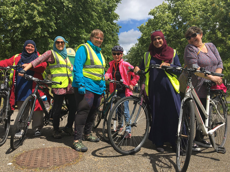 a diverse group of women cyclists