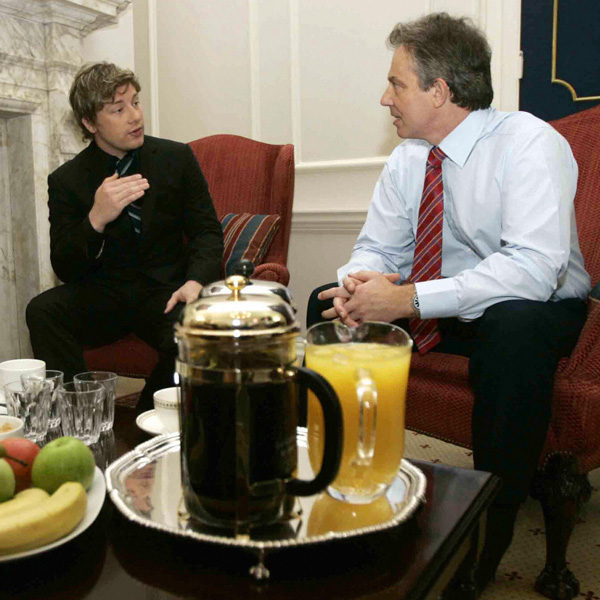 Oliver meets PM Tony Blair in 2005 to press for healthier school meals for kids. free school meals