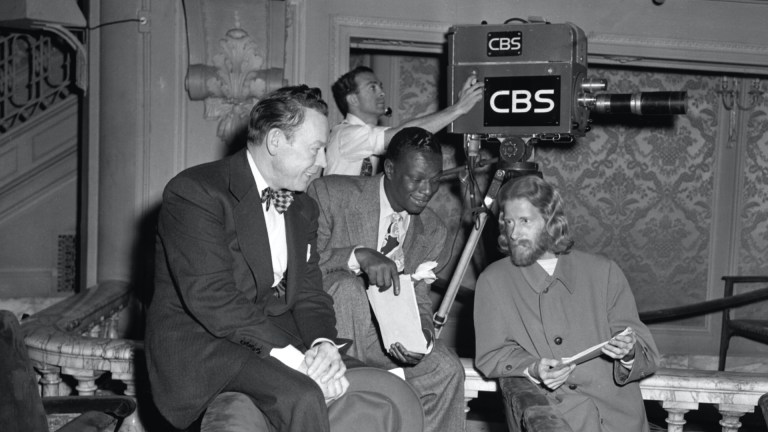 Songwriter and original hippie eden ahbez, right, with Nat King Cole and Fred Allen, left, in 1948.