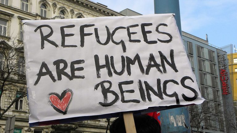 Sign saying refugees are human beings