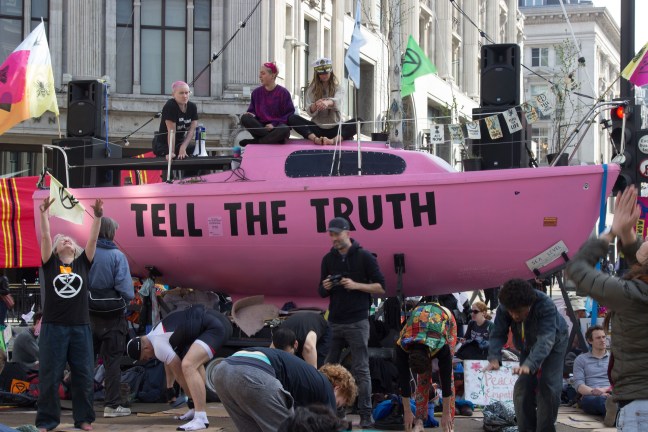 Extinction Rebellion pink boat reading 