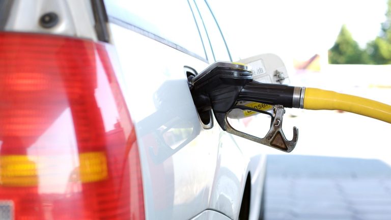 Car being filled with petrol.