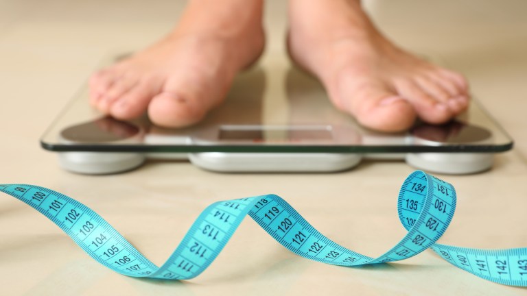 Man standing on scales