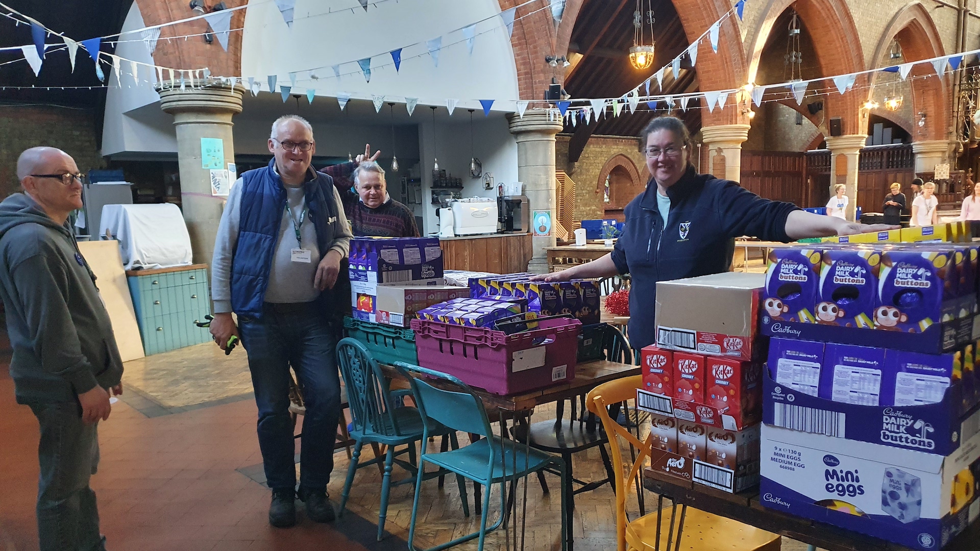 Volunteers at the Earlsfield Foodbank sort Easter eggs for their guests