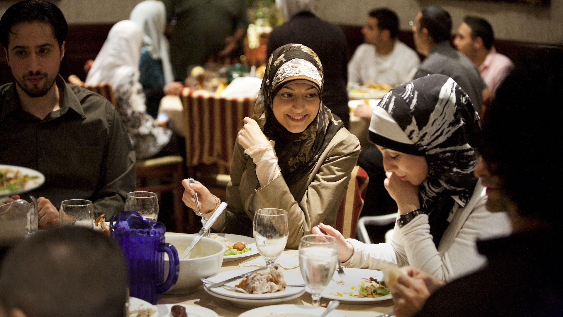 A group of diners breaks the Ramadan fast with iftar at Habib's Cuisine in Dearborn, Michigan. Photo credit: State Dept./Brian Widdis