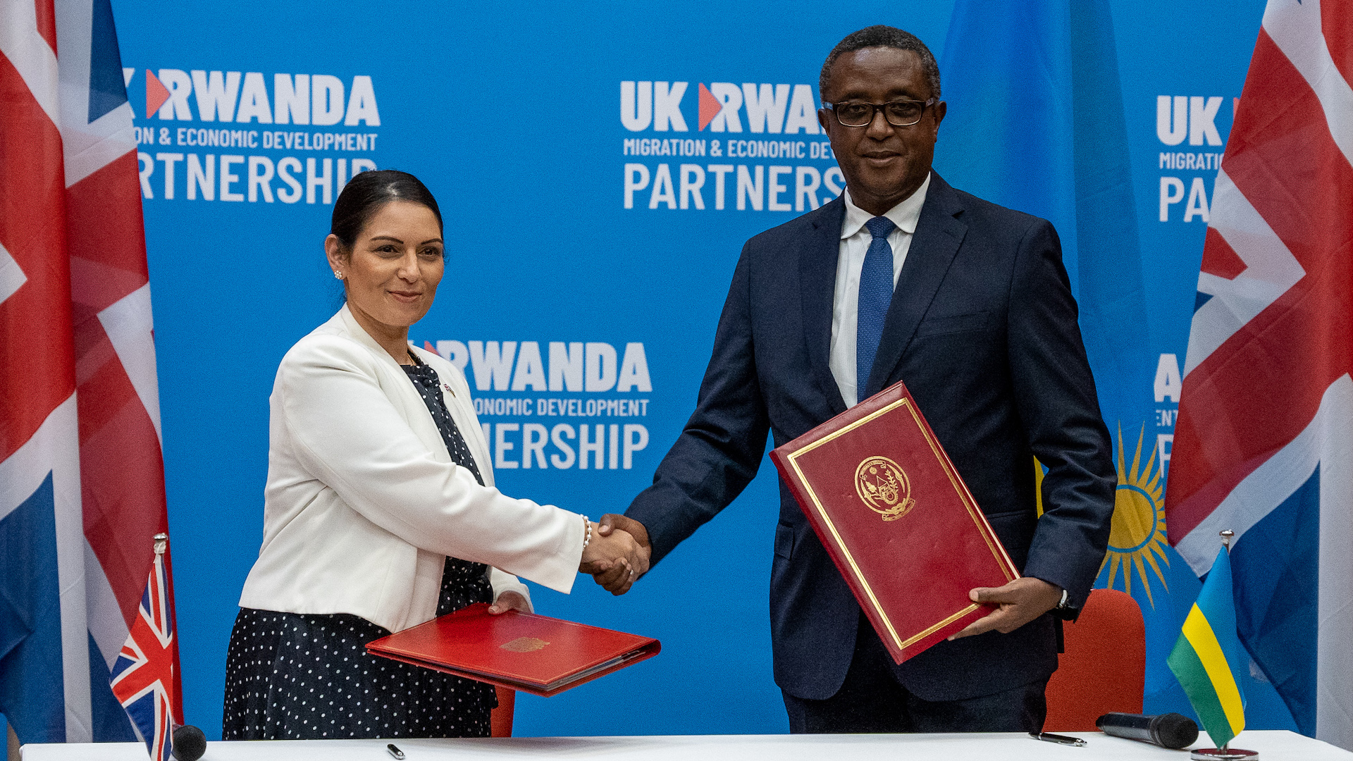 Home Secretary Priti Patel and Minister Biruta sign the migration and economic development partnership between the UK and Rwanda
