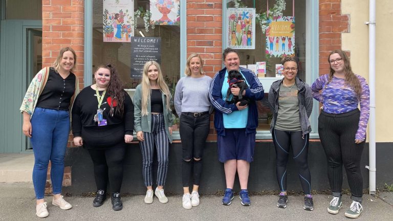 Jenny Adjene (far left) with her core team outside their shop in Tavistock, Devon. Courtesy of Hip Hip Hooray