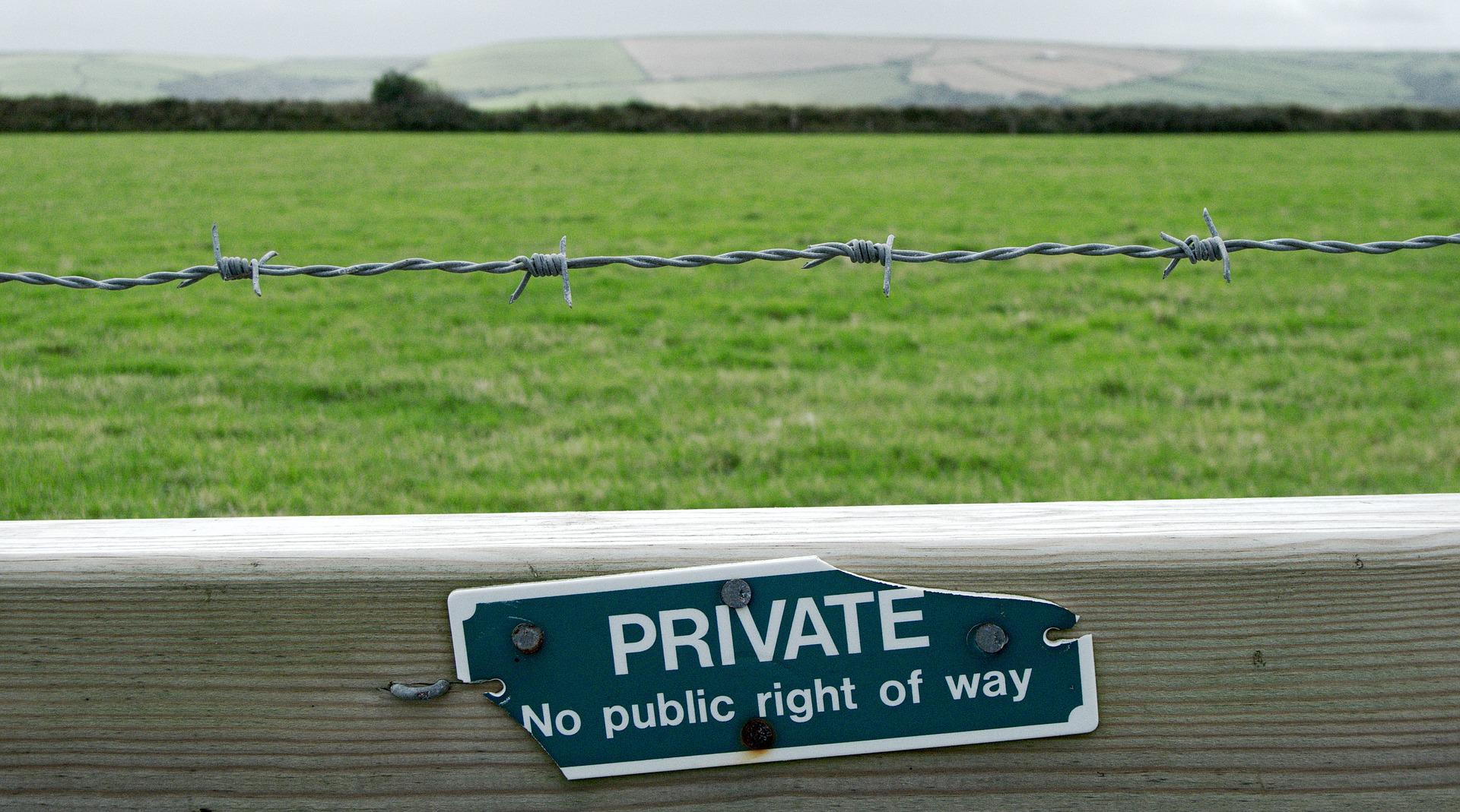 Private sign on a fence