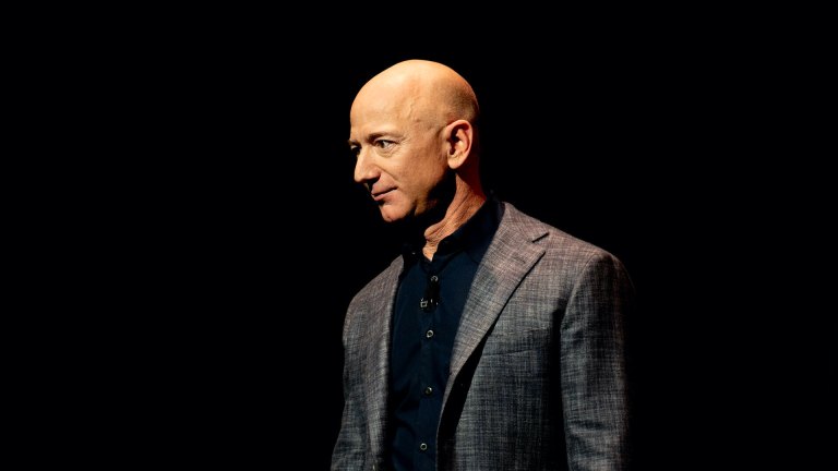 jeff bezos against a black background