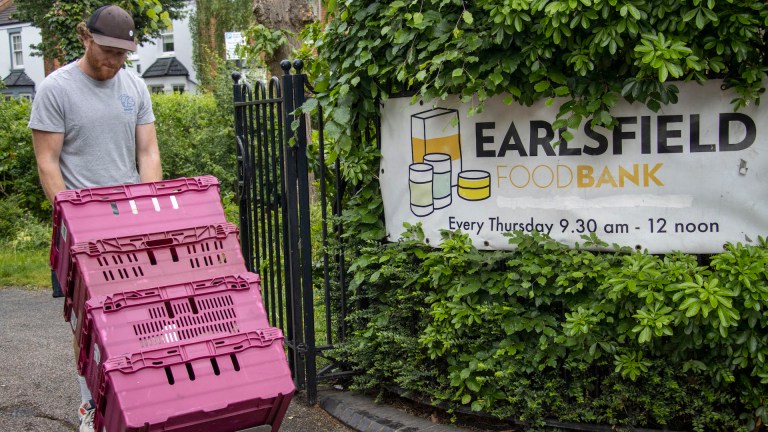 A volunteer delivers food to Earlsfield Foodbank. Image: Earlsfield Foodbank