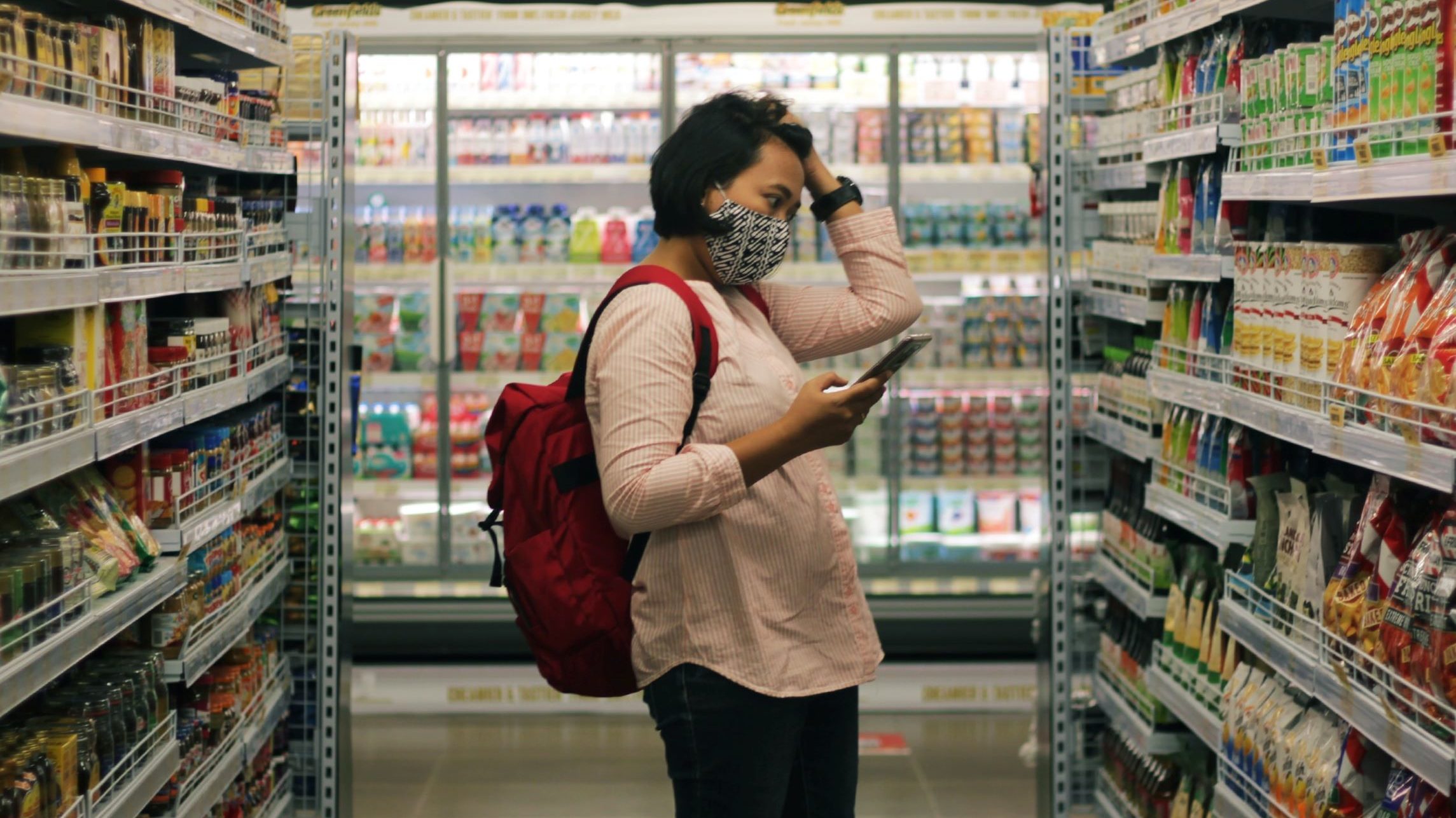 Cost of living/ Image of woman in supermarket