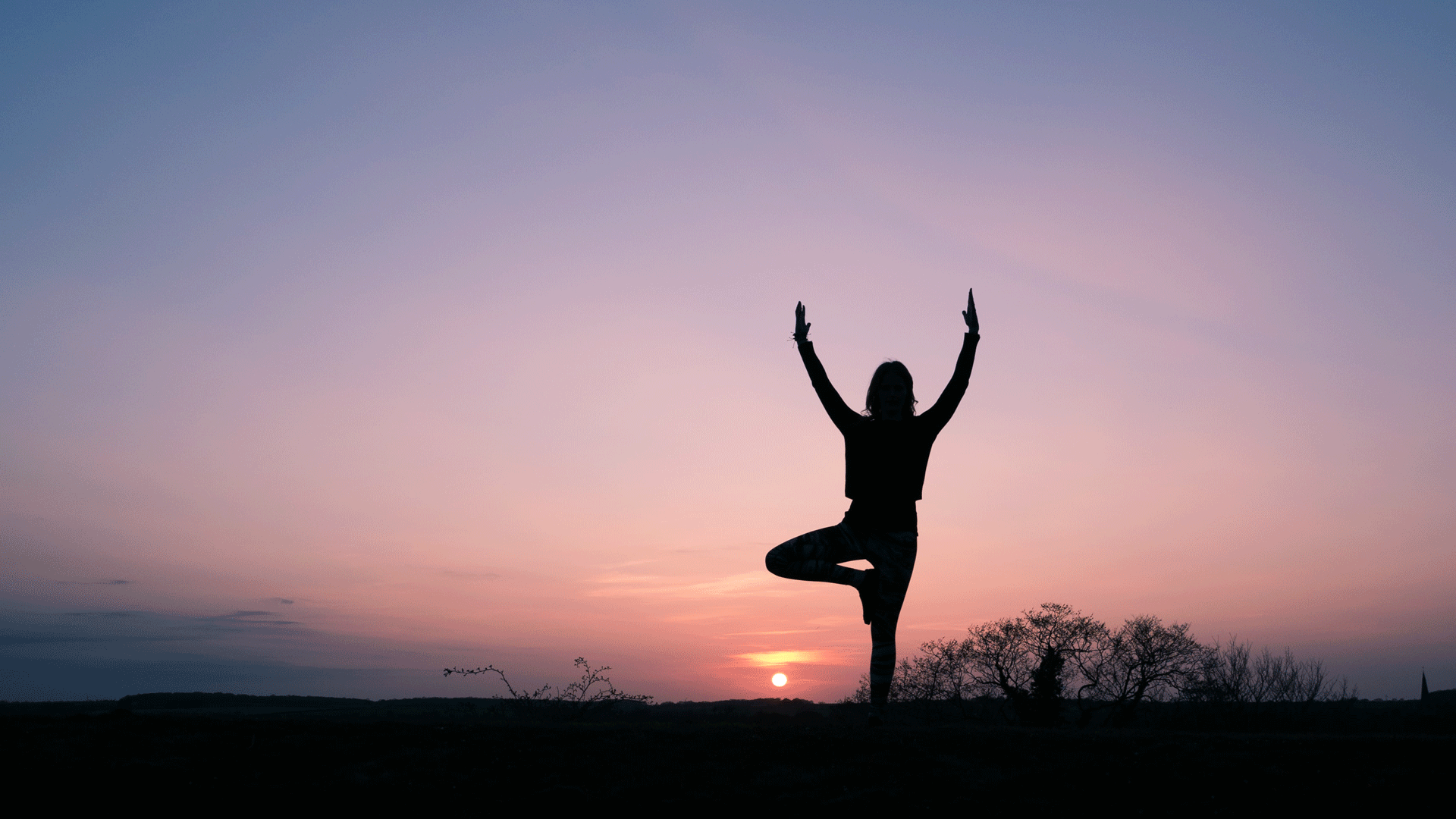 Yoga pose at sunset