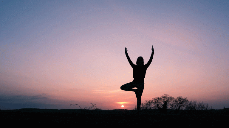 Yoga pose at sunset