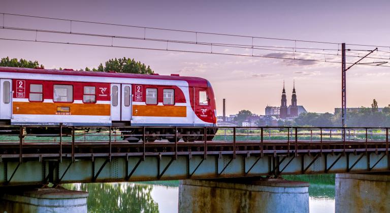 A train travelling over a bridge.