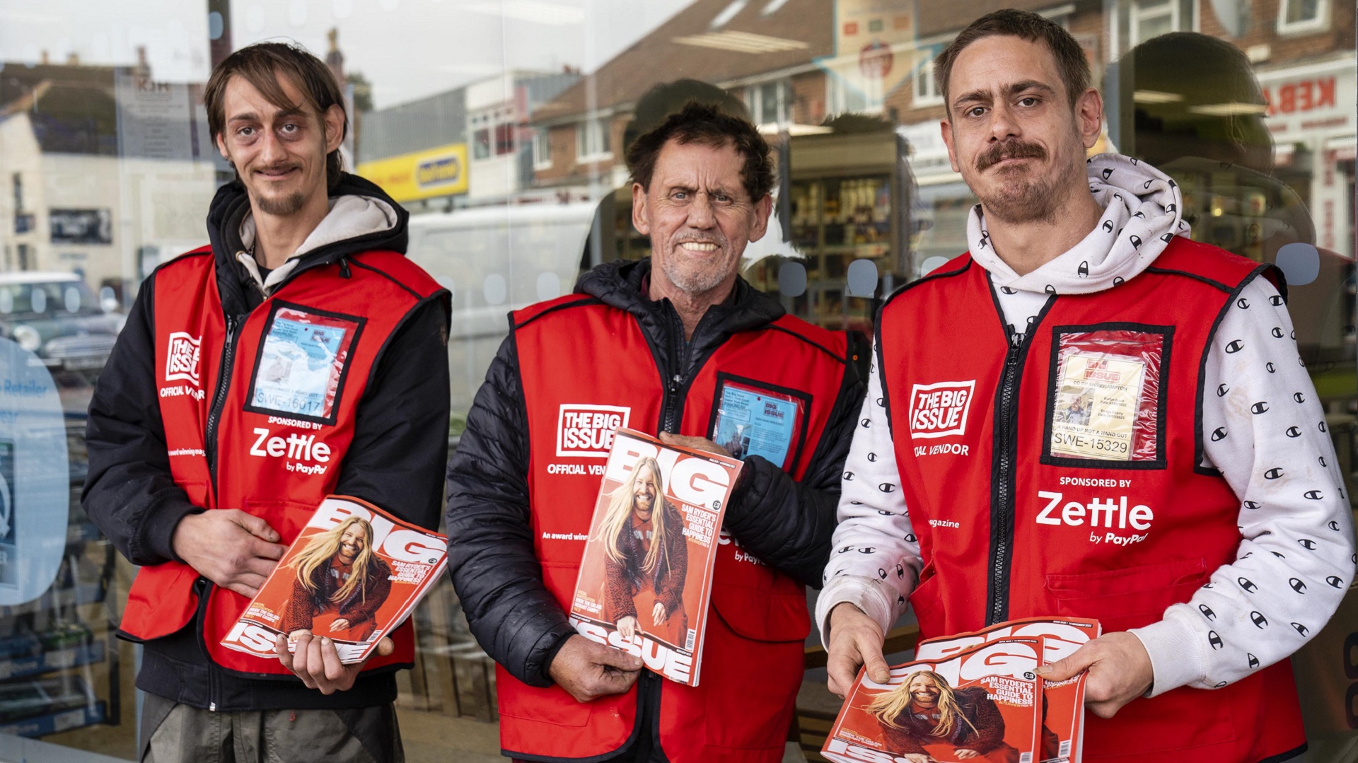 Big Issue vendor Dave Besley with sons Shane and Mark