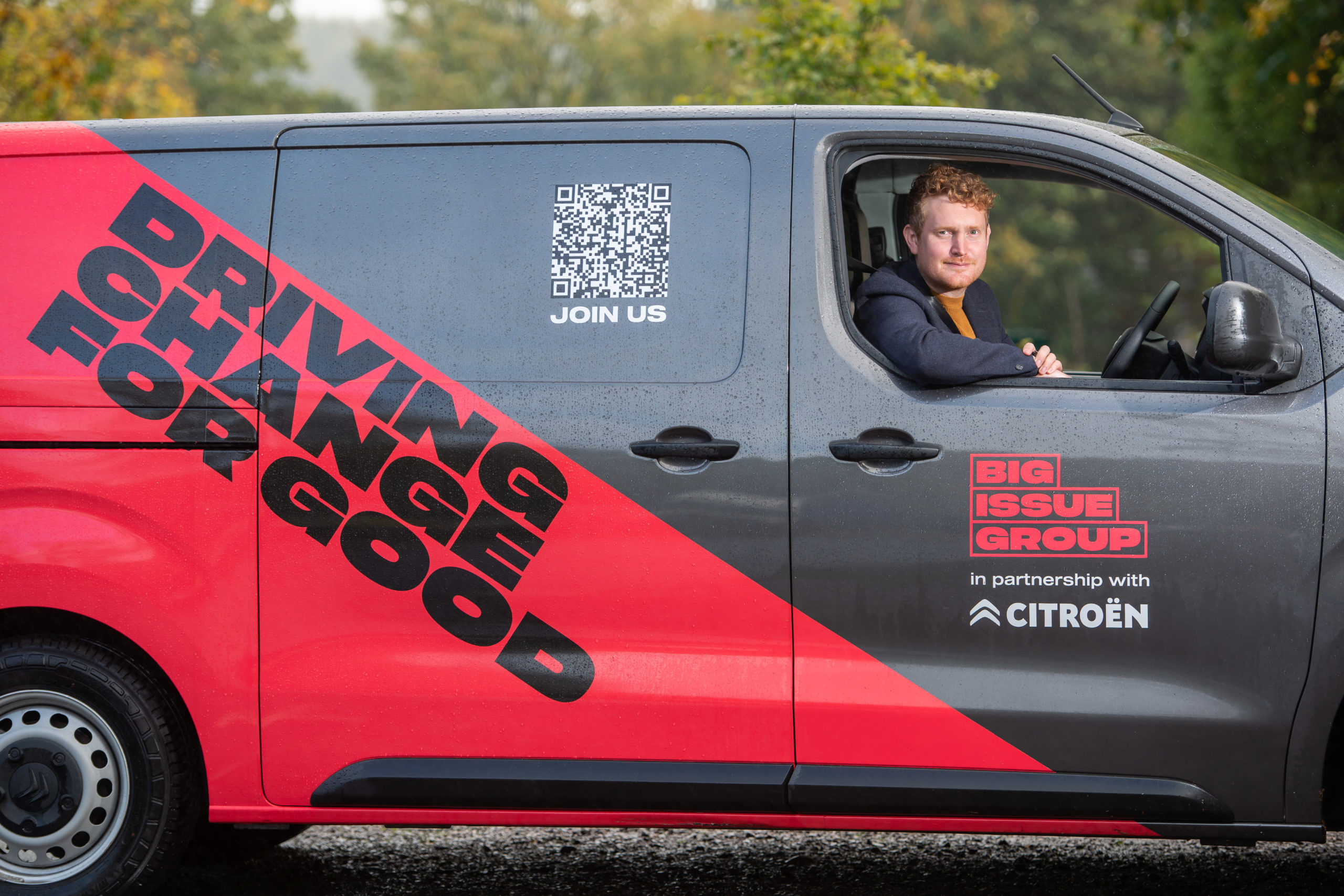 A Big Issue van driver in a new Citroën EV van