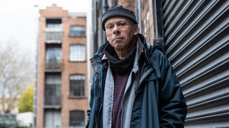 Nicholas, in Liverpool, is wearing a grey beanie and coat with lots of layers under it