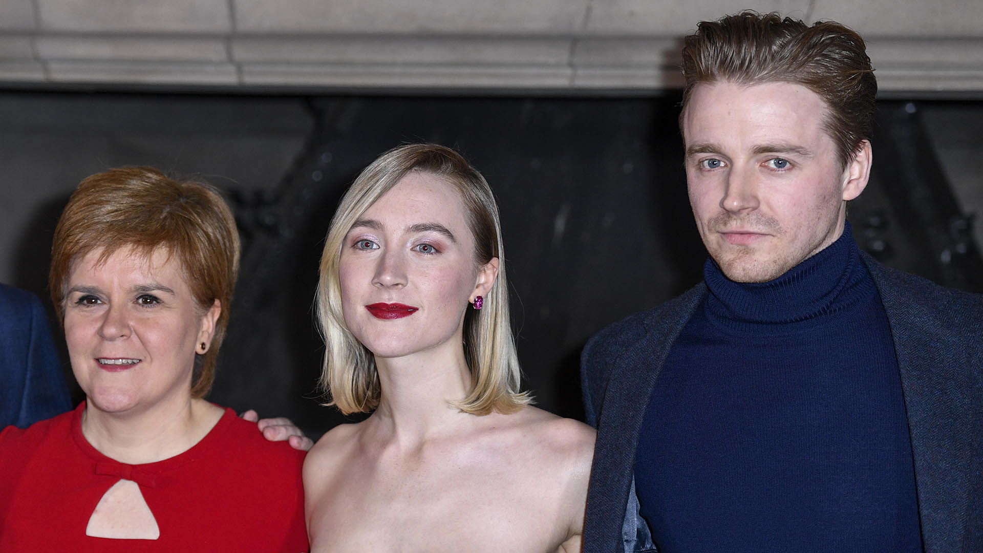 Nicola Sturgeon, Saoirse Ronan and The Gold star Jack Lowden at the Scottish premiere of Mary Queen of Scots at Edinburgh castle. Credit: Euan Cherry/WENN