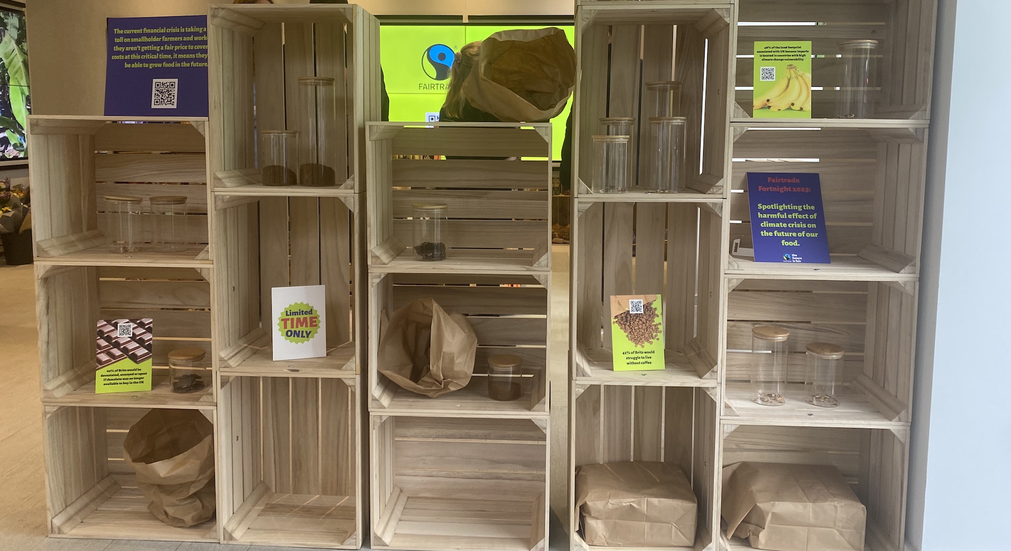 Empty shelves missing supermarket staples in Fairtrade's Endangered Aisle store