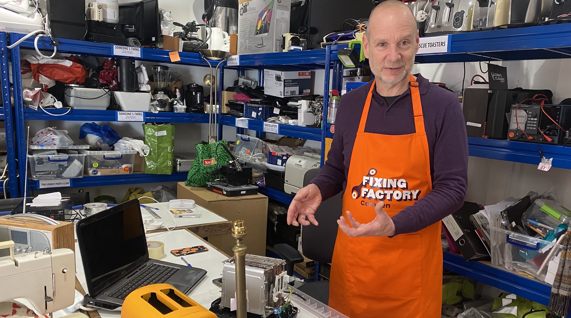 Dermot Jones at the Fixing Factory in Camden fixing a toaster and a lamp