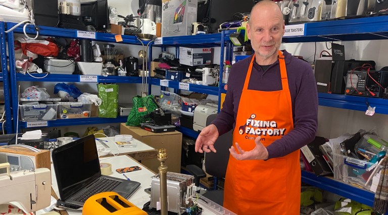 Dermot Jones at the Fixing Factory in Camden fixing a toaster and a lamp