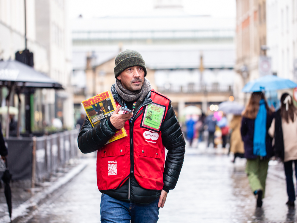 Colin Murray on the street in London, trying to sell The Big Issue