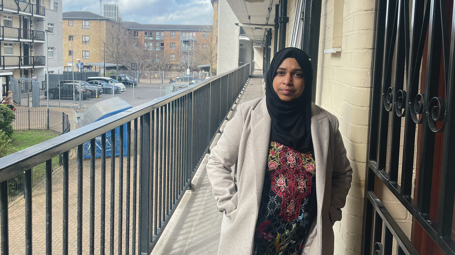 A tenant on a balcony