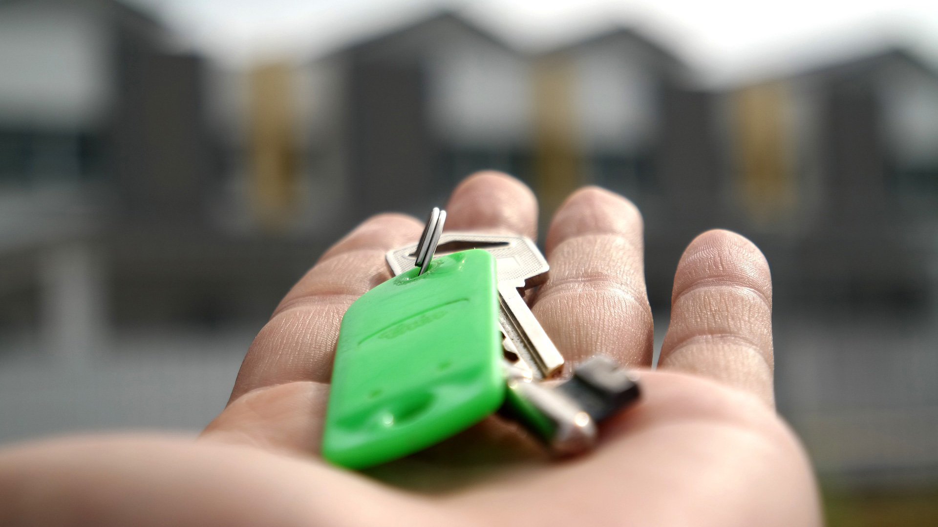 key ring in an outstretched hand