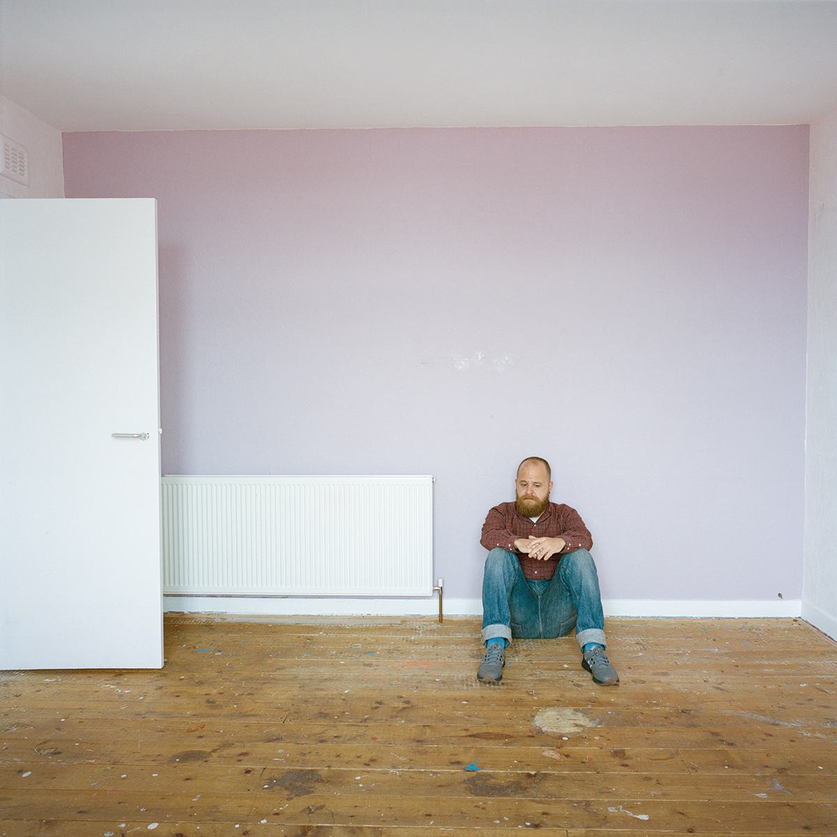 Ryan in an empty living room 