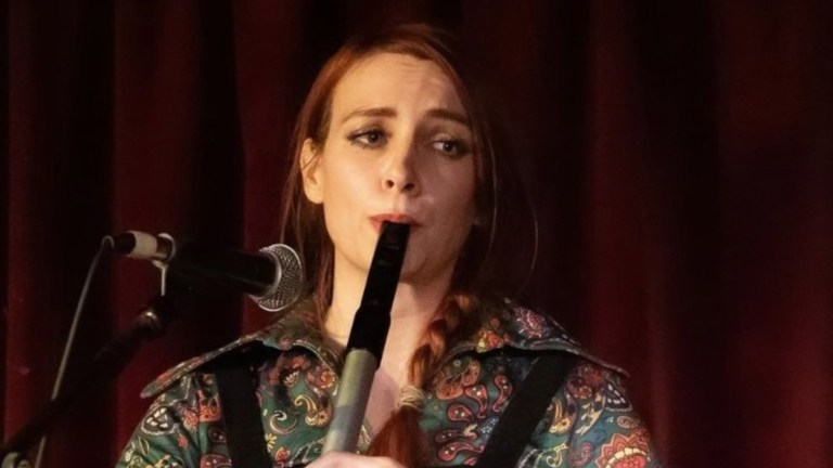 Fiona Fey playing a woodwind instrument
